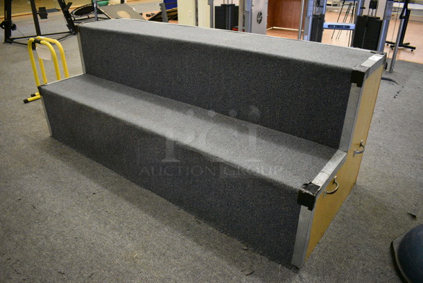 Carpet and Wood Pattern 2 Tier Bleacher / Riser. BUYER MUST REMOVE. 96x38x36. (lobby)