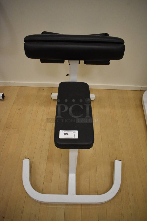 Pace White Metal Leg Extension Machine. BUYER MUST REMOVE. 30x46x33. (behind squash court - right)