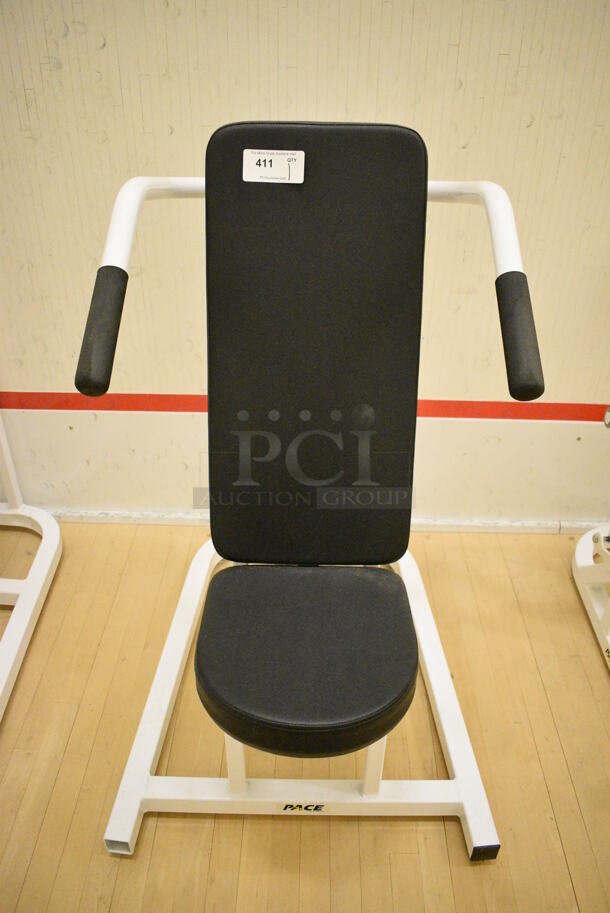 Pace White Metal Shoulder Press Machine. BUYER MUST REMOVE. 30x45x48. (behind squash court - right)