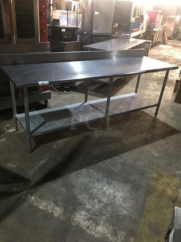 Duke Commercial Work/Prep Table! With Underneath Storage Space! With Backsplash! All Stainless Steel! Model 4165RM! On Legs!