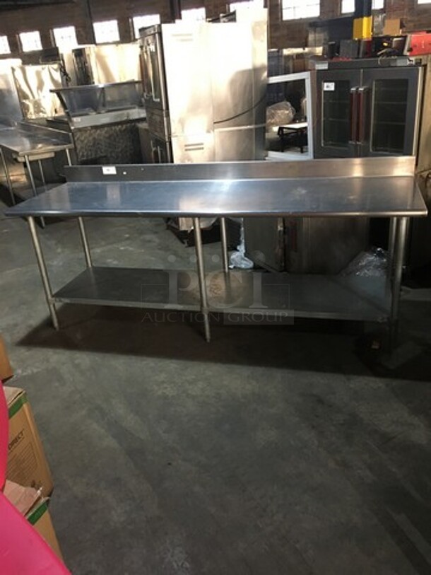 WOW! Duke Commercial Work/Prep Table! With Backsplash! With Underneath Storage Space! All Stainless Steel! Model 4165RM! On Legs!