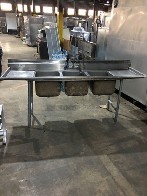 Advance Tabco Commercial 3 Compartment Sink! With Left & Right Side Drainboard! With Backsplash! With Faucet & Jet Spray Hose! All Stainless Steel! Model T935418RL! On Legs! 