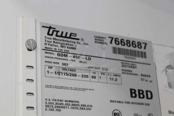 FANTASTIC! True Model GDM-49F-LD Commercial Double Glass Door Lighted Freezer Merchandiser On Commercial Casters. 53.5x30x83. Hardwired! 115/208-230V. 60Hz. 1 Phase. Tested And Working! Buyer Must Remove.Shipping Is Not Available.  - Image 3 of 5