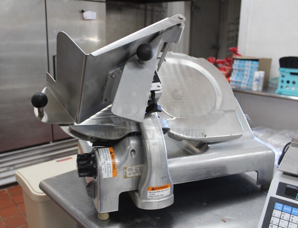 GREAT FIND! Berkel Model 909FS Commercial Countertop Meat/Cheese Slicer. 24.5x18x20.5. 115V/60Hz. Tested And Working! Shipping Is Not Available.