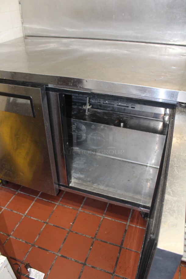 TERRIFIC! Turbo Air Model MUF-48 Commercial Stainless Steel Double Door Undercounter Freezer On Commercial Casters. 48x30x36.5. 115V/60Hz. Tested And Powers On But Does Not Cool. Buyer Must Remove. Shipping Is Not Available. - Image 5 of 6