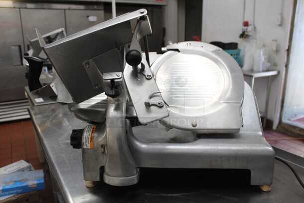 GREAT! Berkel Model 909FS Commercial Countertop Meat/Cheese Slicer With Sharpener.  18.25x22.5x21. 115V/60Hz. Tested And Working!  Shipping Is Not Available.