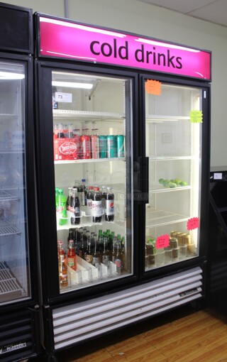 AWESOME! True Model GDM-49 Commercial Double Sliding Glass Door Refrigerated Merchandising Cooler On Commercial Casters. . 54x30x82.5. 115V/60Hz. Tested And Working! Buyer Must Remove!  Shipping Is Not Available.