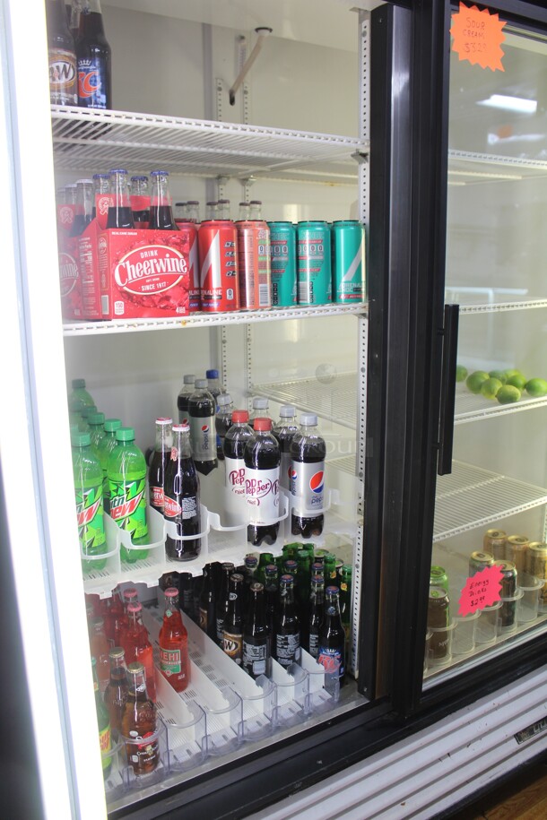 AWESOME! True Model GDM-49 Commercial Double Sliding Glass Door Refrigerated Merchandising Cooler On Commercial Casters. . 54x30x82.5. 115V/60Hz. Tested And Working! Buyer Must Remove!  Shipping Is Not Available. - Image 2 of 5