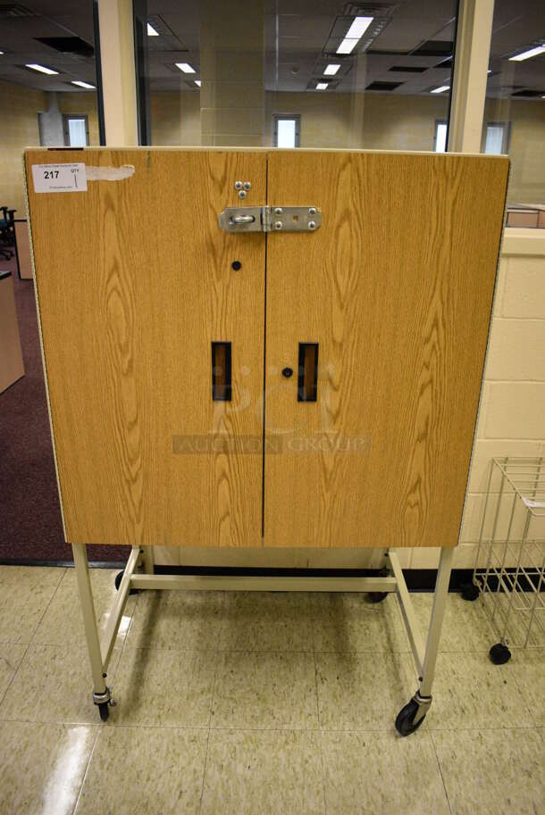 Wood Pattern 2 Door Cabinet on Commercial Casters. 36x25x58. (John N. Hall Tech - Room 109)