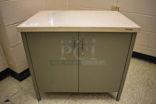 White and Green Metal 2 Door Counter. 30x21x27. (John N. Hall Tech - Room 109)