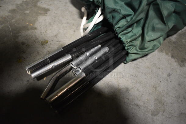 Green Bag w/ Tent and Poles Inside. 16x9x9. (facilities) - Image 2 of 3