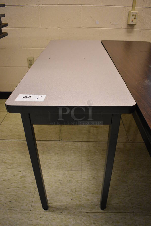 Table. 48x18x29. (John N. Hall Tech - Room 108)