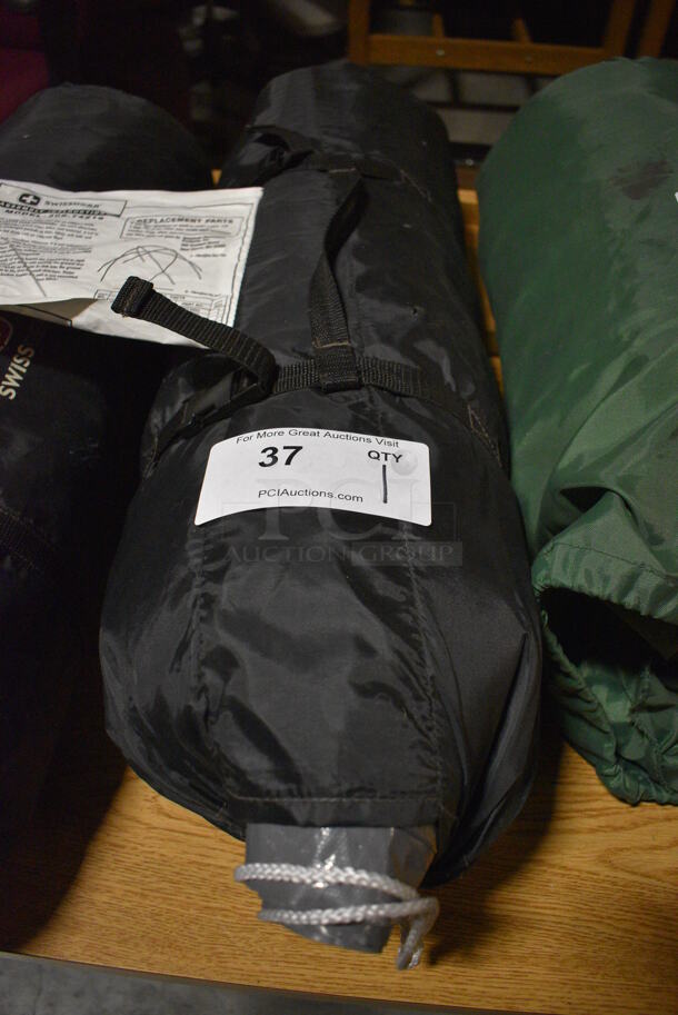 Swiss Gear Black Bag w/ Tent. 27x8x8. (facilities)