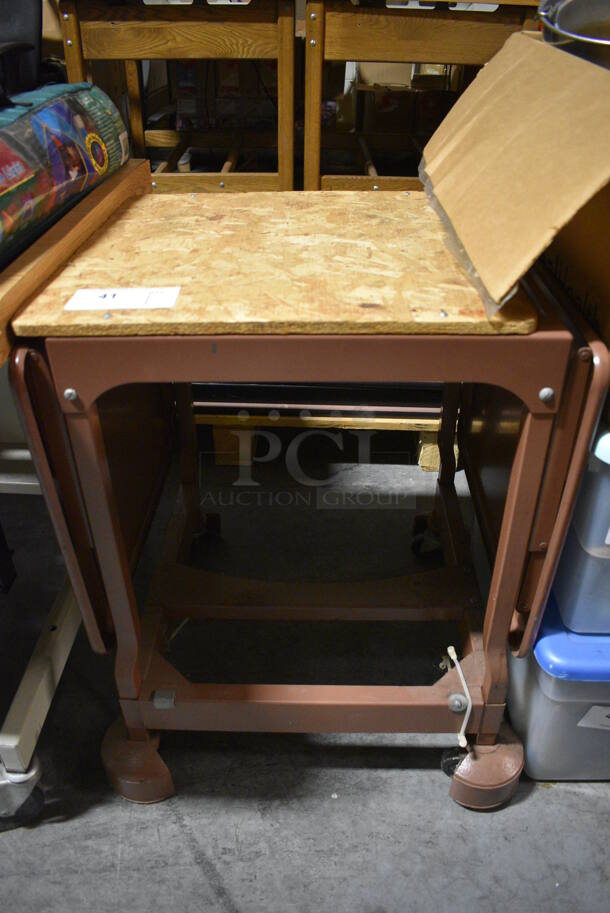 Brown Metal Cart on Casters. 21x19x27. (facilities)