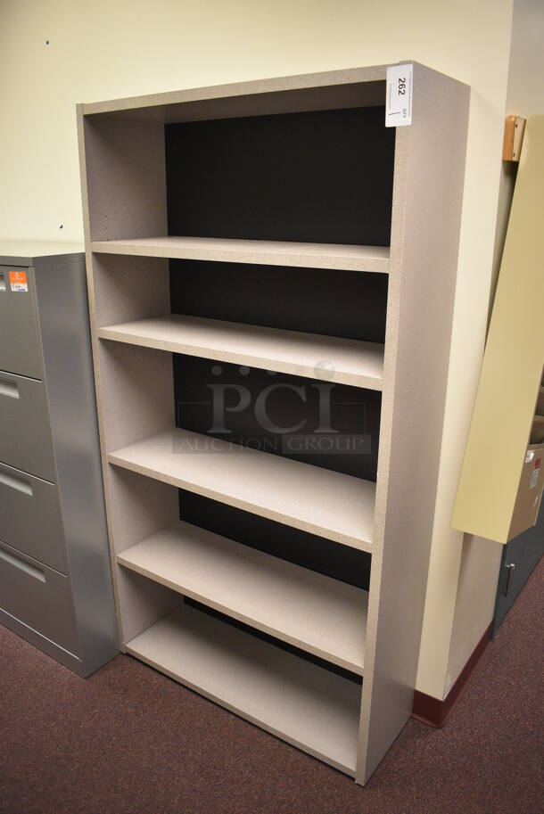 Gray Bookshelf. 36x12x67. (John N. Hall Tech - Room 122)