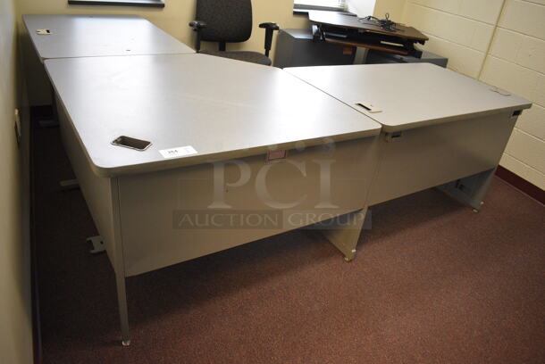Gray L Shaped Desk. 84x90x30. (John N. Hall Tech - Room 122 Office G)