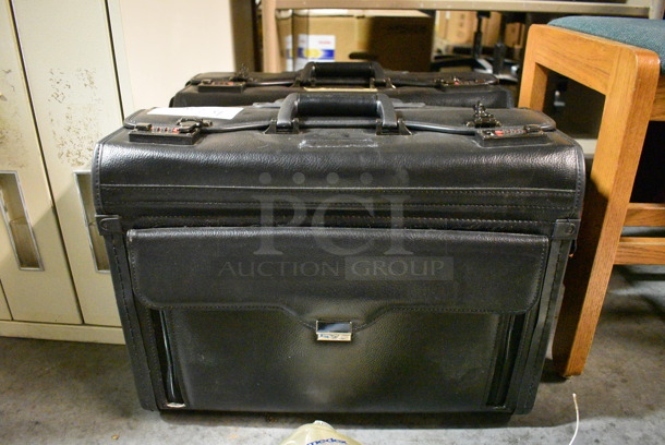 2 Black Briefcases. Does Not Come w/ Combination. 19x9x15. 2 Times Your Bid! (facilities)