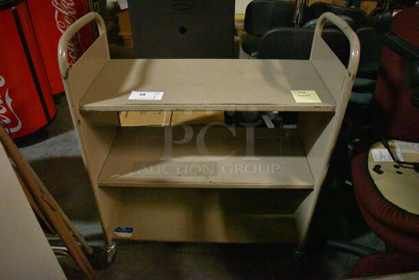 Tan Metal 3 Tier Book Cart on Commercial Casters. 32x15x39. (facilities)