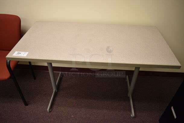 Gray Table. 48x24x29. (John N. Hall Tech - Room 122 Office K)