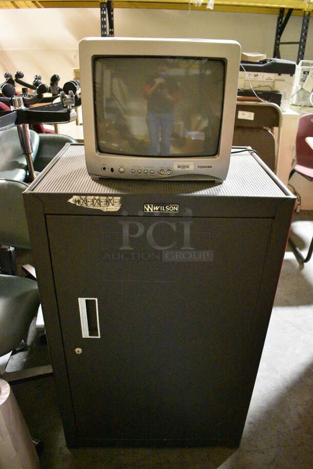 Toshiba 14" Color Television Monitor on Wilson Black Stand. 24x18x50. (facilities) - Image 1 of 5