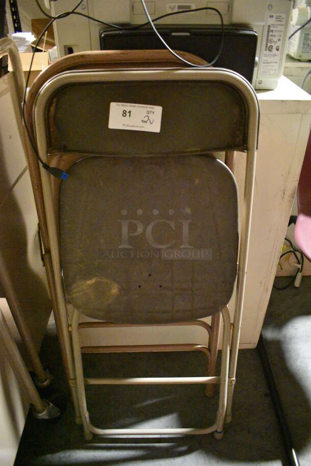 2 Folding Chairs. 18x16x39. 2 Times Your Bid! (facilities)