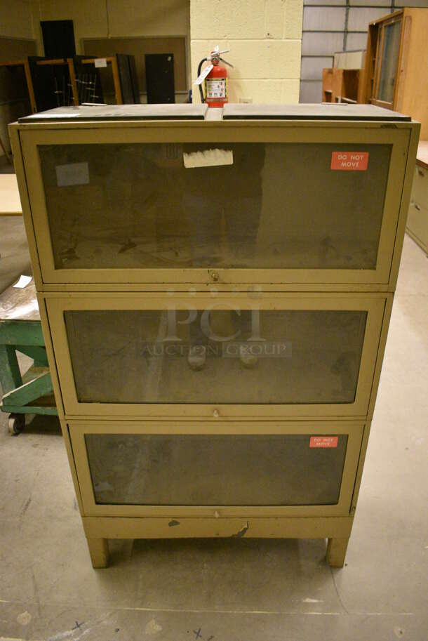 Metal 3 Tier Cabinet. 33x13x55. (John N. Hall Tech - Room 121)