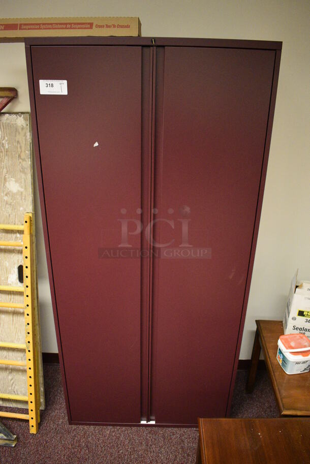 Maroon Metal 2 Door Cabinet. 36x18x77.5. (Whitaker Hall - Room 132)