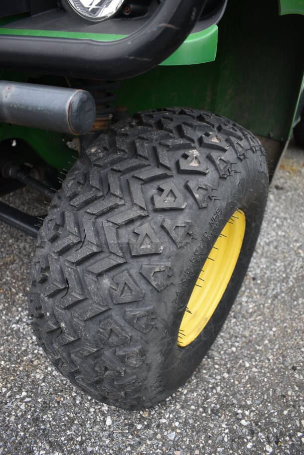 2007 John Deere Gator HPX 4x4 Gas Powered Utility Vehicle. Comes w/ Snow Plow Attachment Not Shown In Pictures! 3,109 Hours. Vehicle Runs and Drives! See Lot #12 For Additional Pictures. 52x120x74. This Item Needs To Be Removed On Pick Up Day: 2/10/21 - Image 4 of 12