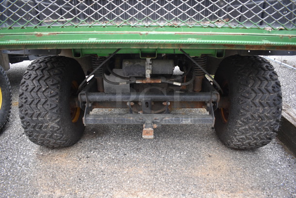 2007 John Deere Gator HPX 4x4 Gas Powered Utility Vehicle. Comes w/ Snow Plow Attachment Not Shown In Pictures! 3,109 Hours. Vehicle Runs and Drives! See Lot #12 For Additional Pictures. 52x120x74. This Item Needs To Be Removed On Pick Up Day: 2/10/21 - Image 10 of 12