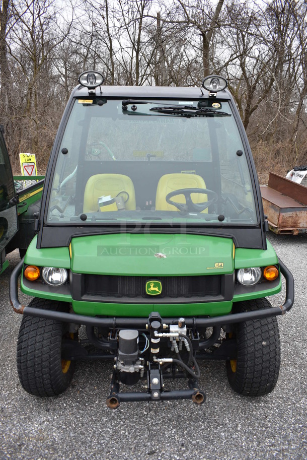 2009 John Deere Gator XUV 620i 4x4 Gas Powered Utility Vehicle. Comes w/ Snow Plow Attachment That Is Not Shown In Pictures! 2,184 Hours. Vehicle Runs and Drives! See Lot #14 For Additional Pictures. 62x120x74. This Item Needs To Be Removed On Pick Up Day: 2/10/21 - Image 2 of 12