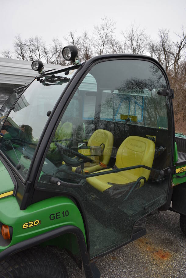 2009 John Deere Gator XUV 620i 4x4 Gas Powered Utility Vehicle. Comes w/ Snow Plow Attachment That Is Not Shown In Pictures! 2,184 Hours. Vehicle Runs and Drives! See Lot #14 For Additional Pictures. 62x120x74. This Item Needs To Be Removed On Pick Up Day: 2/10/21 - Image 7 of 12