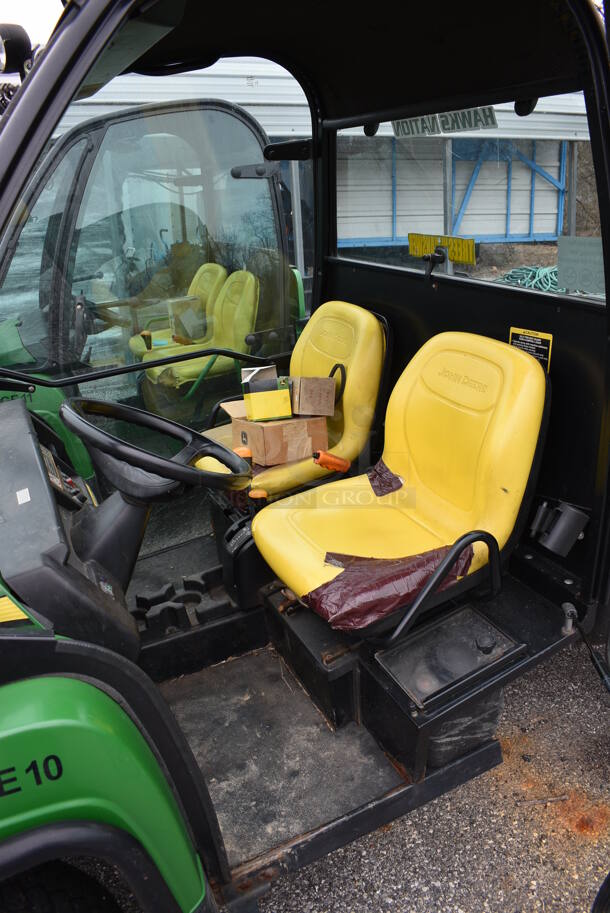 2009 John Deere Gator XUV 620i 4x4 Gas Powered Utility Vehicle. Comes w/ Snow Plow Attachment That Is Not Shown In Pictures! 2,184 Hours. Vehicle Runs and Drives! See Lot #14 For Additional Pictures. 62x120x74. This Item Needs To Be Removed On Pick Up Day: 2/10/21 - Image 8 of 12