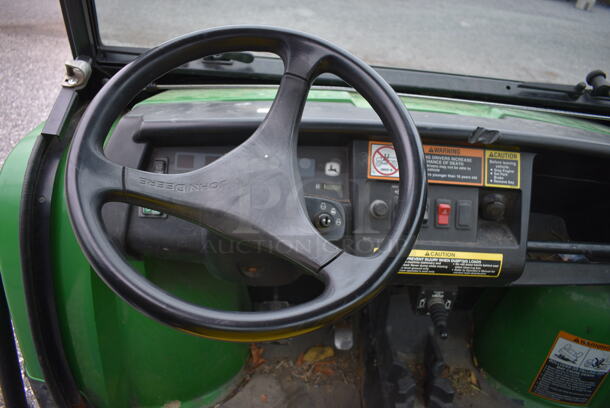 2009 John Deere Gator XUV 620i 4x4 Gas Powered Utility Vehicle. Comes w/ Snow Plow Attachment That Is Not Shown In Pictures! 2,184 Hours. Vehicle Runs and Drives! See Lot #14 For Additional Pictures. 62x120x74. This Item Needs To Be Removed On Pick Up Day: 2/10/21 - Image 10 of 12