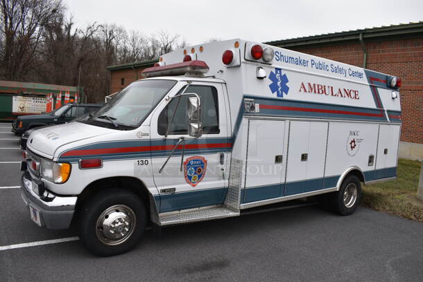 1998 Braun Ford E-Super Duty Power Stroke Diesel Ambulance w/ Additional Air Conditioning In Rear Compartment and 6 Exterior Cabinets. Odometer Reads 105,207. VIN 1FDXE40F4XHA22974. Title In Hand. Vehicle Runs and Drives! See Lot #2 For Additional Pictures. This Item Needs To Be Removed On Pick Up Day: 2/10/21 - Image 1 of 12