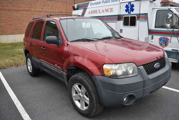 2005 Ford Escape Hybrid SUV. Odometer Reads 141,990. VIN 1FMYU96H75KD42741. Title In Hand. Vehicle Runs and Drives! See Lot #4 For Additional Pictures. This Item Needs To Be Removed On Pick Up Day: 2/10/21 - Image 3 of 12