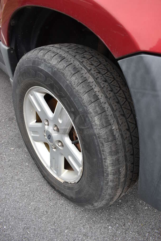 2005 Ford Escape Hybrid SUV. Odometer Reads 141,990. VIN 1FMYU96H75KD42741. Title In Hand. Vehicle Runs and Drives! See Lot #4 For Additional Pictures. This Item Needs To Be Removed On Pick Up Day: 2/10/21 - Image 4 of 12