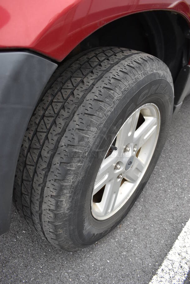 2005 Ford Escape Hybrid SUV. Odometer Reads 141,990. VIN 1FMYU96H75KD42741. Title In Hand. Vehicle Runs and Drives! See Lot #4 For Additional Pictures. This Item Needs To Be Removed On Pick Up Day: 2/10/21 - Image 5 of 12