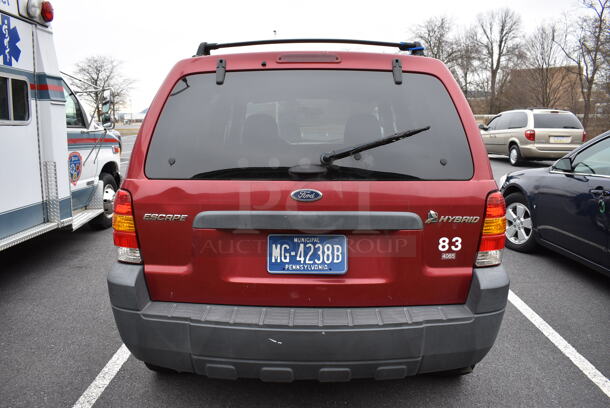 2005 Ford Escape Hybrid SUV. Odometer Reads 141,990. VIN 1FMYU96H75KD42741. Title In Hand. Vehicle Runs and Drives! See Lot #4 For Additional Pictures. This Item Needs To Be Removed On Pick Up Day: 2/10/21 - Image 8 of 12
