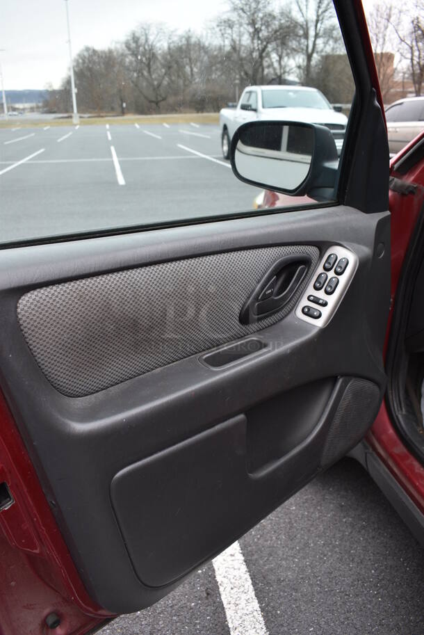 2005 Ford Escape Hybrid SUV. Odometer Reads 141,990. VIN 1FMYU96H75KD42741. Title In Hand. Vehicle Runs and Drives! See Lot #4 For Additional Pictures. This Item Needs To Be Removed On Pick Up Day: 2/10/21 - Image 9 of 12