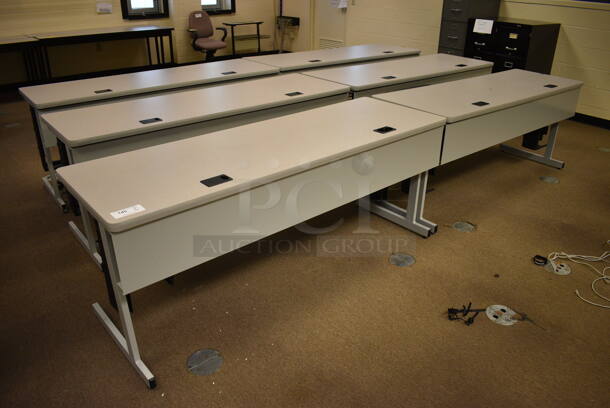 6 Computer Desks. 71.5x28x29. 6 Times Your Bid! (John N. Hall Tech - Room 103)