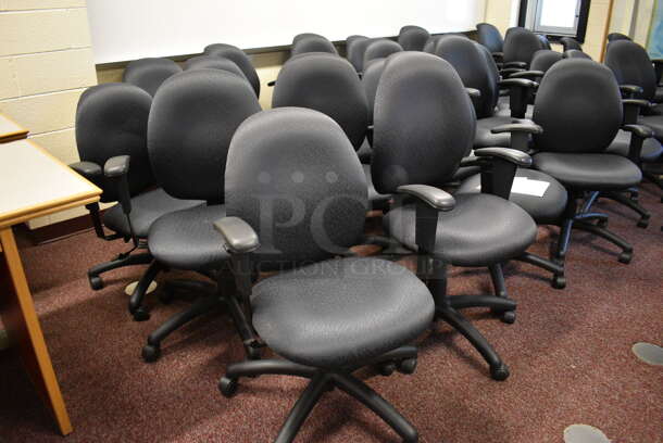 6 Black Office Chairs w/ Arm Rests on Casters. Stock Picture - Cosmetic Condition May Vary. 24x21x39. 6 Times Your Bid! (John N. Hall Tech - Room 101) - Image 2 of 4