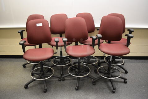 7 Maroon Office Chairs w/ Foot Rest Rail and Arm Rests on Casters. 24x20x48. 7 Times Your Bid! (John N. Hall Tech - Room 102)