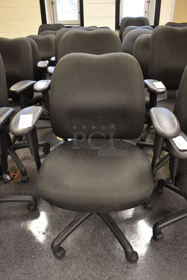 5 Black Office Chairs w/ Arm Rests on Casters. Stock Picture - Cosmetic Condition May Vary. 24x21x39. 5 Times Your Bid! (John N. Hall Tech - Room 104) - Image 1 of 3