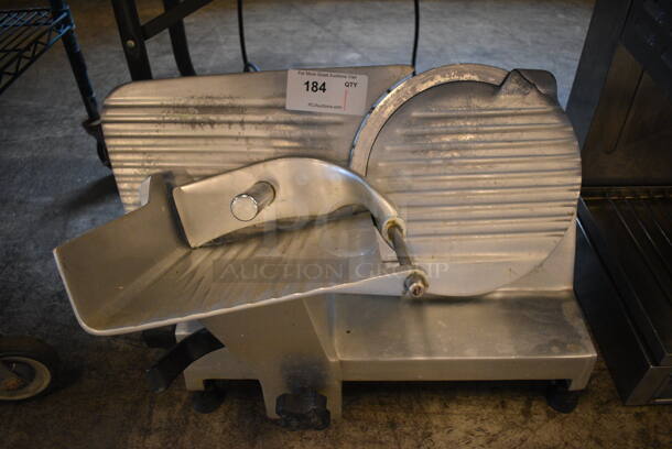 NICE! Anvil Model SLR7012 Metal Commercial Countertop Meat Slicer. 115 Volts, 1 Phase. 24x20x20. Tested and Working!