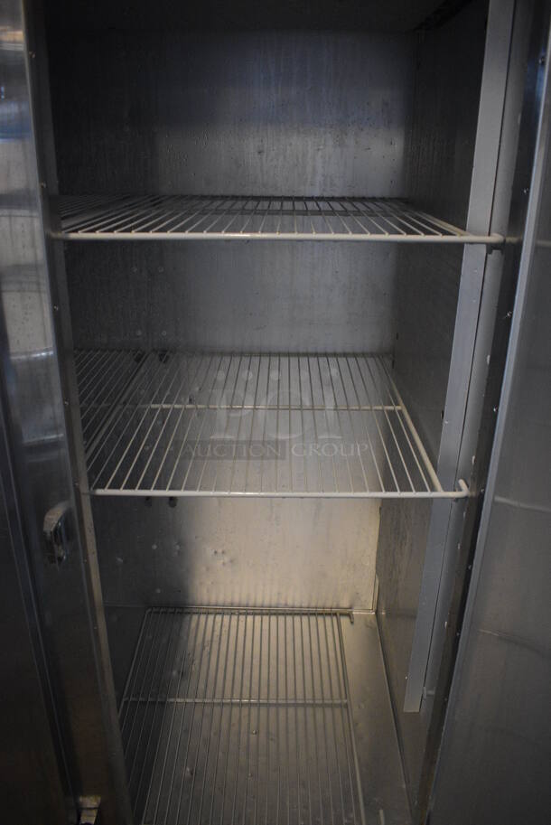 GREAT! Traulsen Model G31310 Stainless Steel Commercial 3 Door Reach In Freezer w/ Poly Coated Racks on Commercial Casters. 115/208 Volts, 1 Phase. 76x34x83 - Image 5 of 6