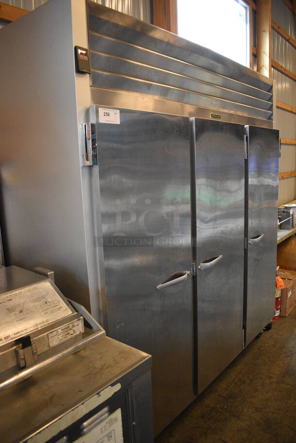 GREAT! Traulsen Model G31310 Stainless Steel Commercial 3 Door Reach In Freezer w/ Poly Coated Racks on Commercial Casters. 115/208 Volts, 1 Phase. 76x34x83 - Image 6 of 6