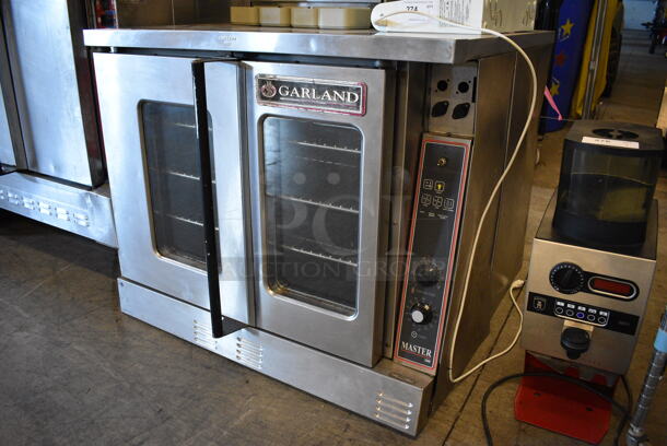 BEAUTIFUL! Garland Master 300 Stainless Steel Commercial Electric Powered Full Size Convection Oven w/ View Through Doors, Metal Oven Racks and Thermostatic Controls. 38x38x32 - Image 2 of 6