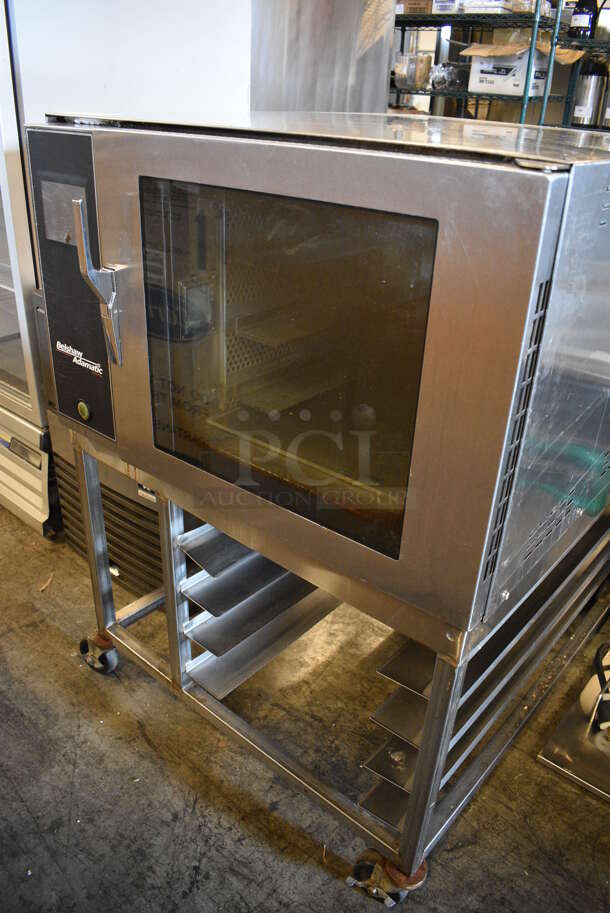 BEAUTIFUL! 2012 Belshaw Adamatic Mono Model FG189T-UZ84 Stainless Steel Commercial Electric Powered Convection Oven w/ View Through Door and Stainless Steel Pan Rack on Commercial Casters. 208/220 Volts, 3 Phase. 33x44x48 - Image 2 of 6