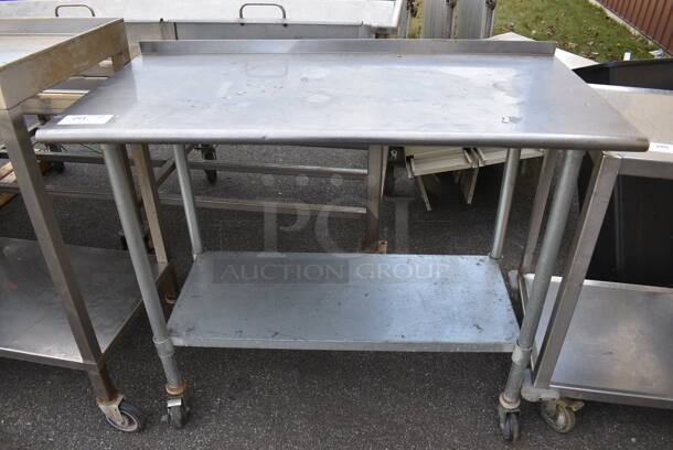 Stainless Steel Commercial Table w/ Metal Undershelf on Commercial Casters. 47.5x24x41 - Image 1 of 3