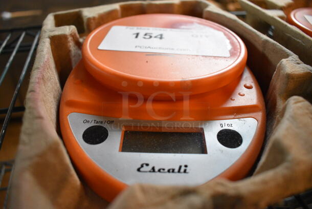 Escali Orange Poly Countertop Food Portioning Scale. 6x8.5x1.5